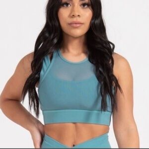 For the Peach teal sports bra size M